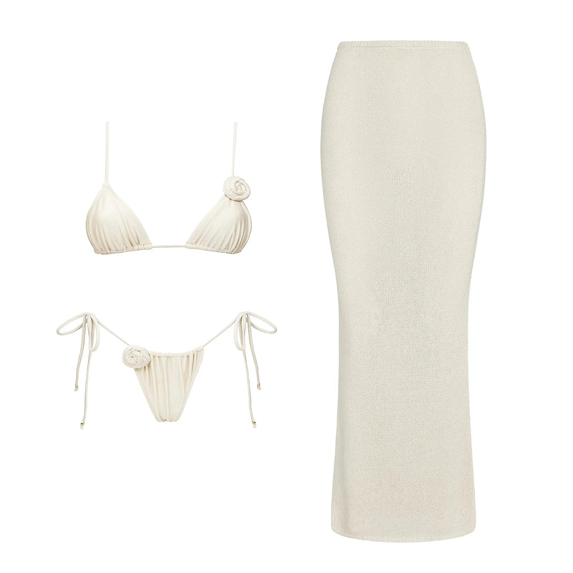 White bikini set with matching skirt on a white background