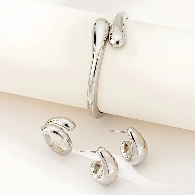 Silver hoop earrings on a white background