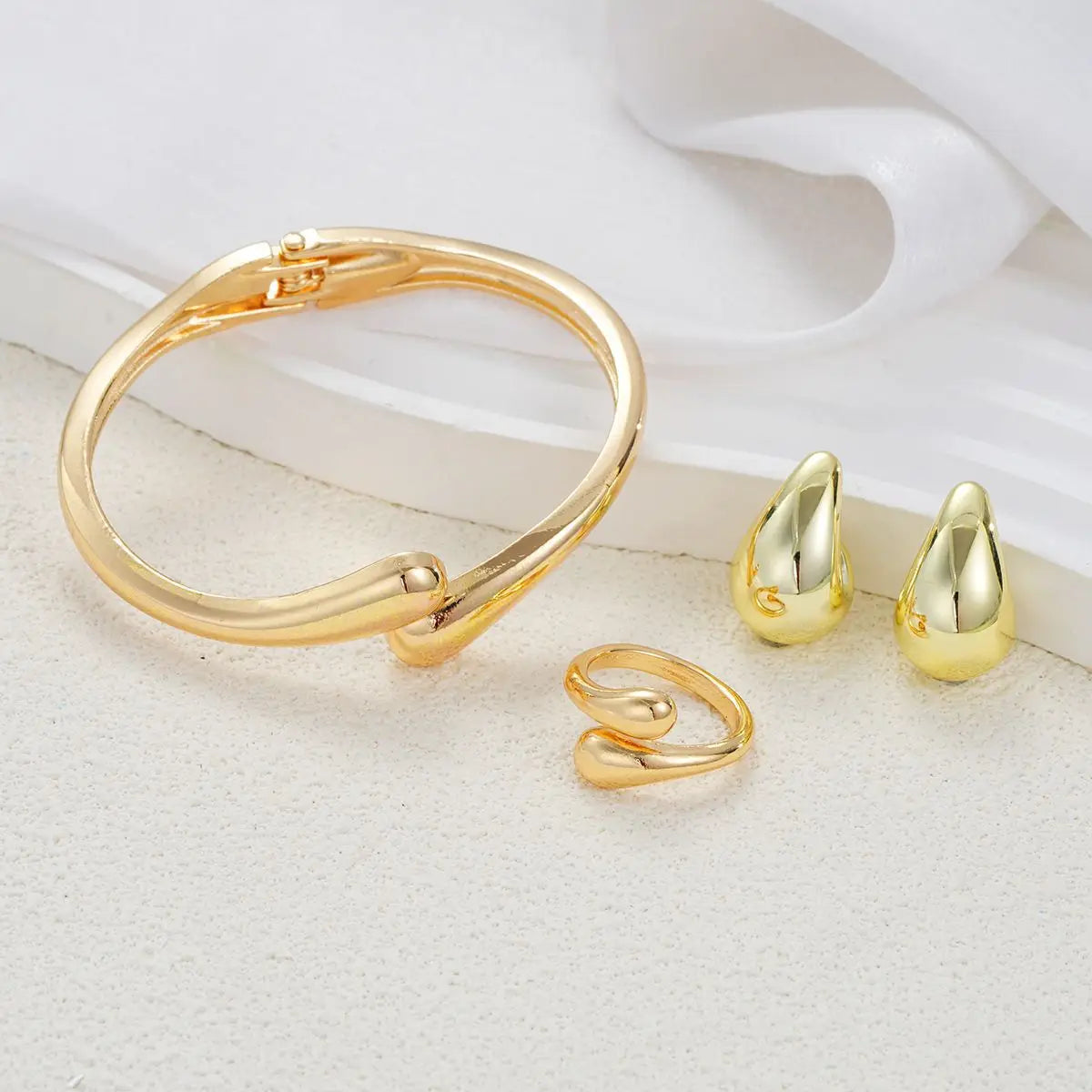3-Piece "Liquid Gold" Jewelry Set | Water Drop Spring Bangle, Ring & Earrings
